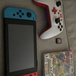 Nintendo switch W/ 2 games and controller pro
