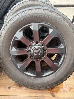 Ram 2500 20in wheels/tires. Tires are Bridgestone 275/65/20 and have a ton of life on them. Wheels are in perfect condition with no curb rash or damag
