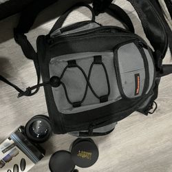 Camera backpack with equipment lenses tripod and more