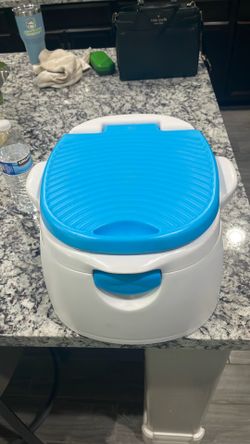 Toddler potty seat.   Munchkin brand