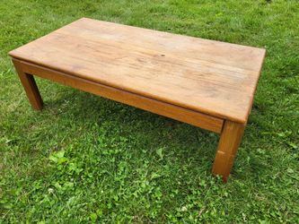 Coffee Table 2'x4' and 16" tall. Solid wood, possibly oak?