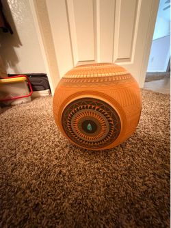 inlaid Diné Navajo pottery piece handcrafted by the artist Myron Charlie.