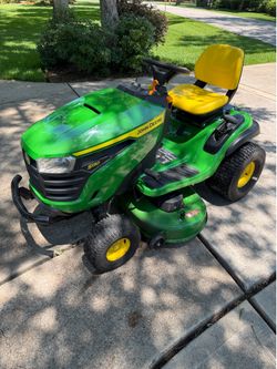 Like - NEW John Deere S130 Riding Mower! Only 20.4 hrs of run time. <1yr old. 42in cutting width.