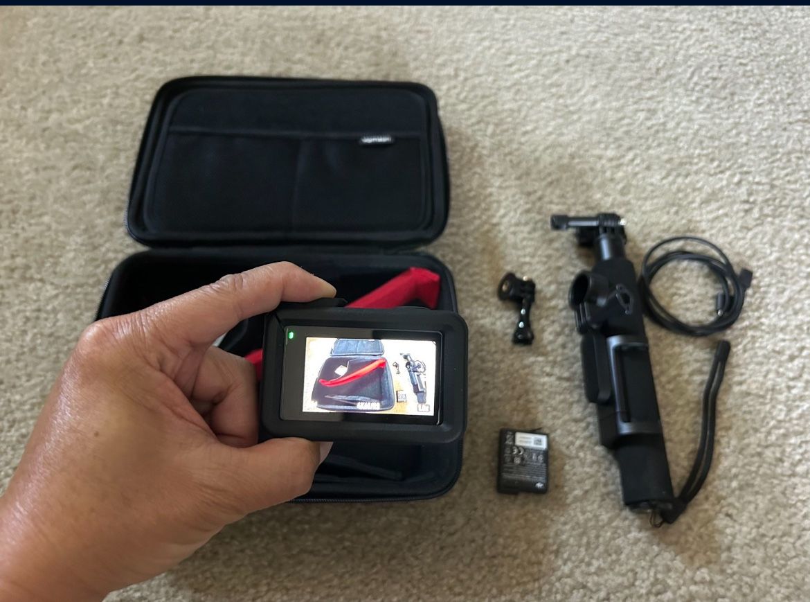 Almost New Osmo Action 3 Camera, Action Extension Rod, 256GB Memory, Cable, 2 Batteries, Portable Tripod and Sturdy Carrying Case