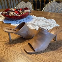 Women’s size 9.5M tan open back heels