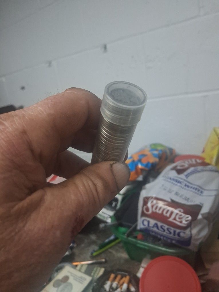 50 Silver Dimes.