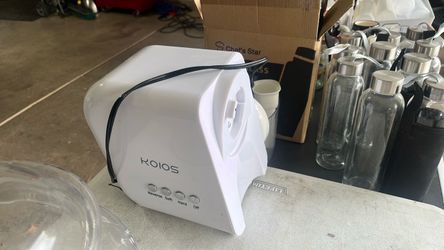 KOIOS juicer and glass bottles