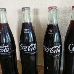 Four Vintage 16 oz. Coke Bottles