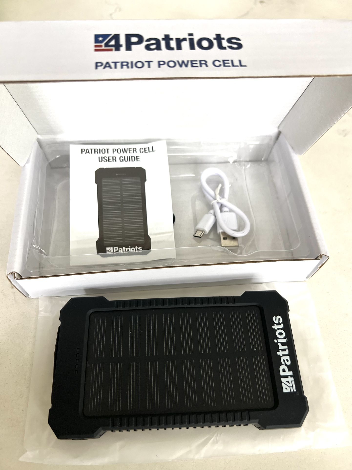 NEW in Box!! 4patriots solar phone charger