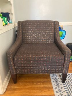 Brown patterned armchair