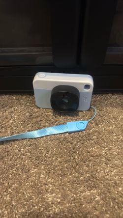 Blue white and black mini camera