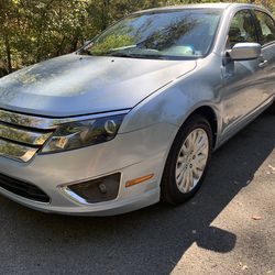 2011 FUSION HYBRID GREAT BUY WITH 40 MPG WITH $5 SUMMER GASOLINE