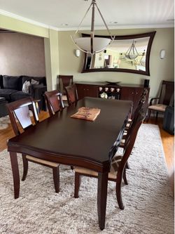 Cherry wood dining table and 8 chairs