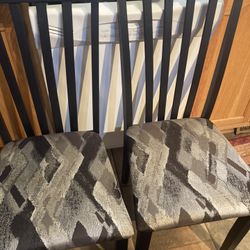 Two zebra print chairs With Storage