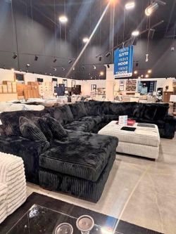 New Oversized Black Sectional with accent pillows