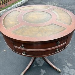 Vintage Leather and Wood Pedestal Drum Table. Round top with tooled leather surface.