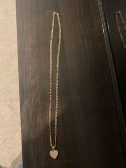 14k gold chain and heart pendant