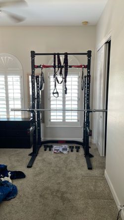 Ethos squat rack with trx ropes, barbell, and hanging abs sling