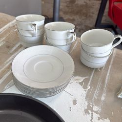 Silver And White China Tea Cups And Saucers 