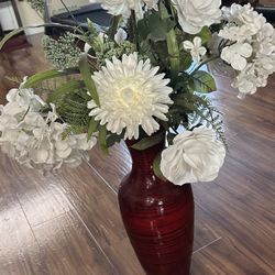 Red Vase With White Flowers