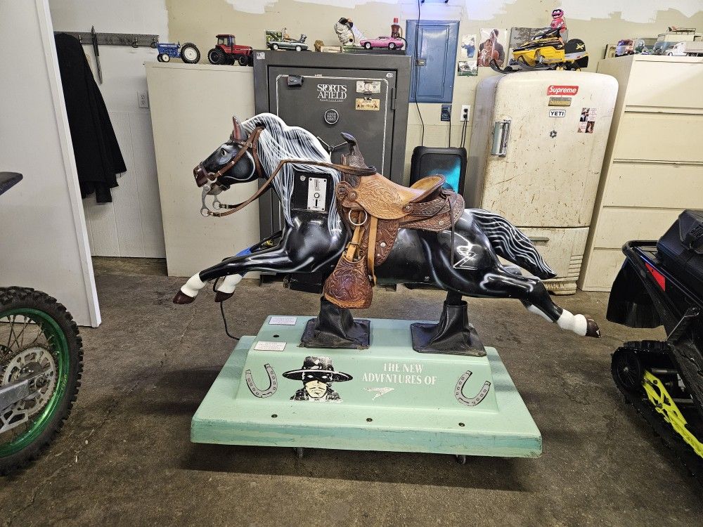 COIN OPERATED HORSE