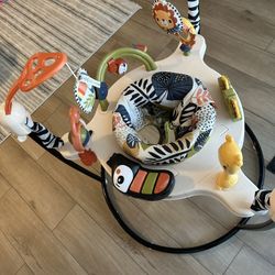 Fisher-Price Baby Bouncer Palm Paradise Jumperoo Activity Center with Music Lights Sounds and Developmental Toys