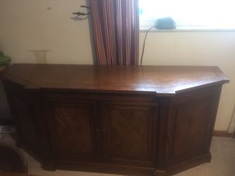 Wooden buffet that is 6foot long with center drawers
