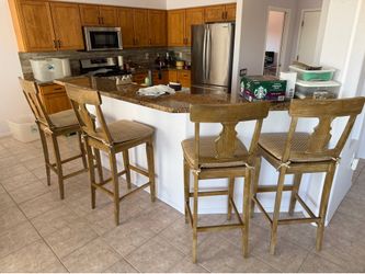 Four matching bar stool chairs