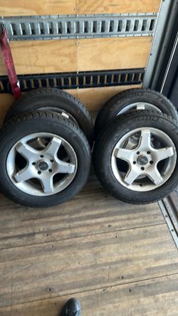 Wheels and tires from a Nissan NV200