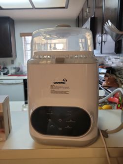 Lavador de tetes de bebe  y decinfecta