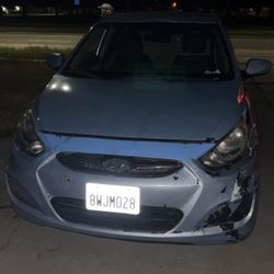 2014 Hyundai Accent · Sedan · Driven 