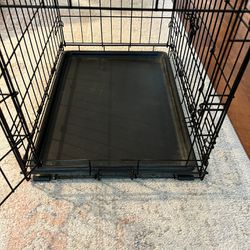 Dog crate with washable bed