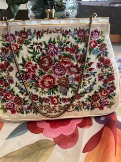 Purse, New vintage with gold tone chain. Mother of Pearl on the edges of this immaculate clean purse