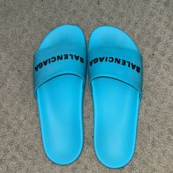 Balenciaga pool slides blue in sky