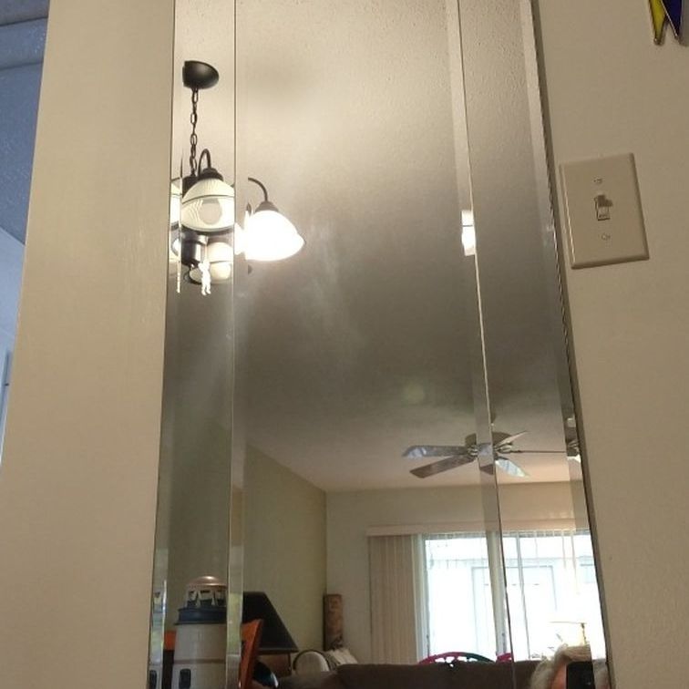 Frameless beveled full length wall mirror