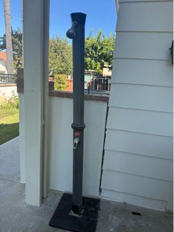 Outdoor solar heated shower