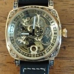 Men's 18 Karat Gold Plated Watch It Is Not Solid Gold It Is Gold Plated Stainless Steel Water Resistant Back Skeleton Fully Automatic