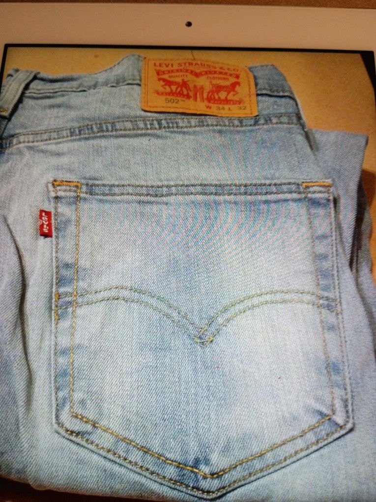 LEVI STRAUSS & CO. "502" LIGHT BLUE DENIM JEANS SIZE W34. L32