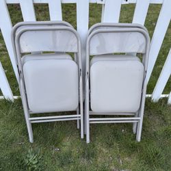 4 Folding Chairs 