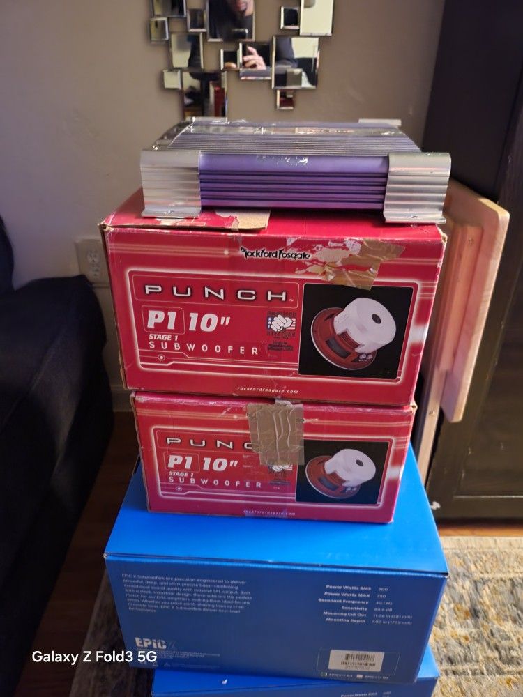 Punch P1 subwoofers, an amp.