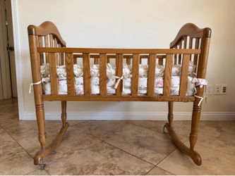 Vintage oak rocking baby cradle