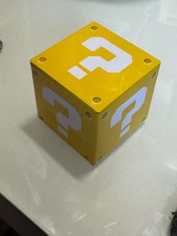 Super Mario Bros coin box tin empty