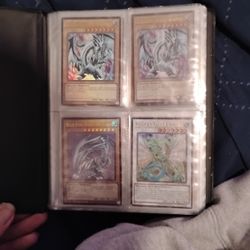 Small Binder And 1996 1E Bundle Of Yu-Gi-Oh 