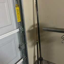 Cap plates with Olympic barbell