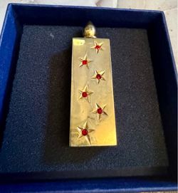 Vintage gold toned perfume bottle
