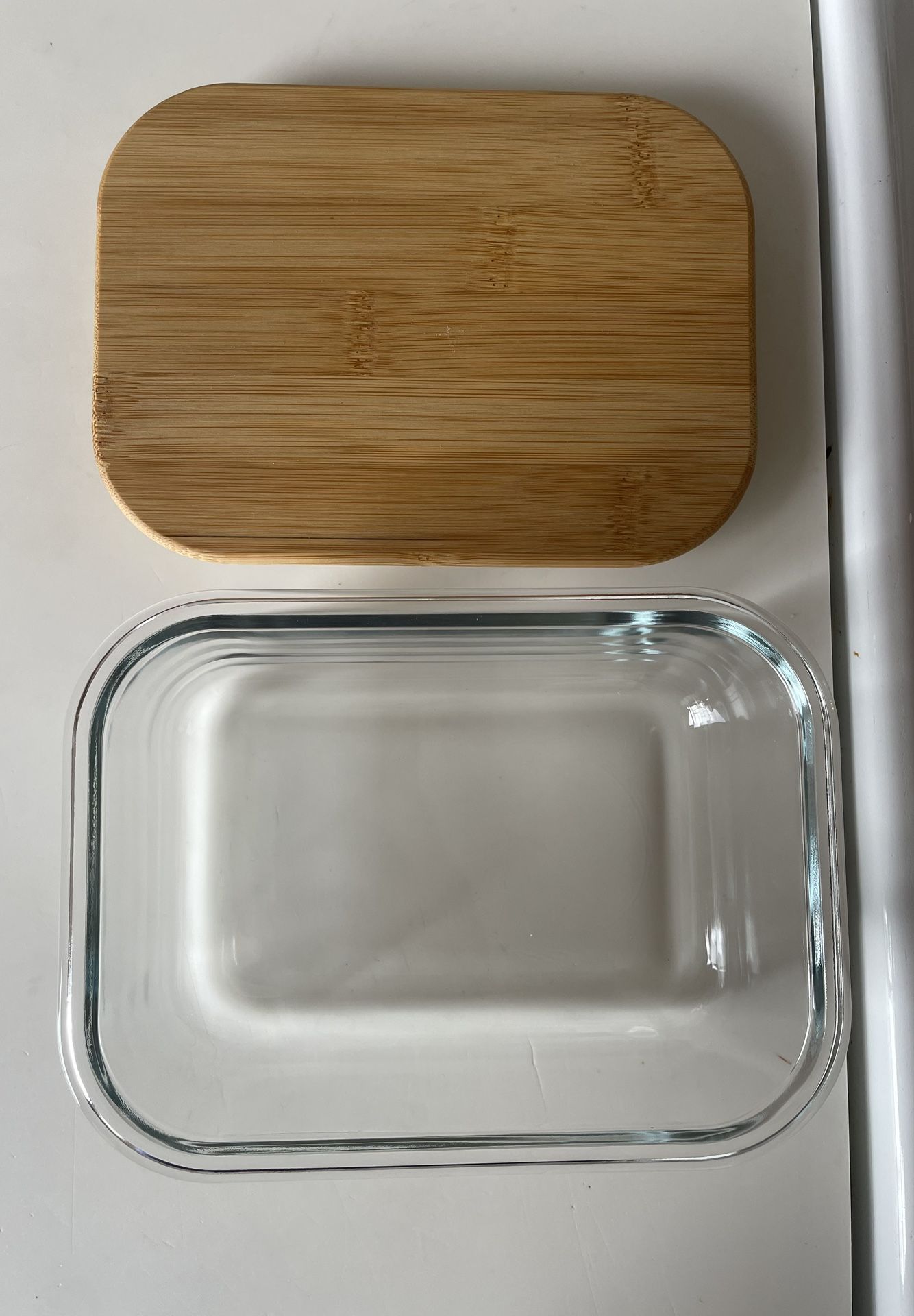 Transparent food container with wood lid