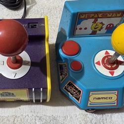 The product is a JAKKS Pacific Namco 5-in-1 Classics Plug and Play TV Game from 2003. It features arcade classics and includes a joystick for gameplay
