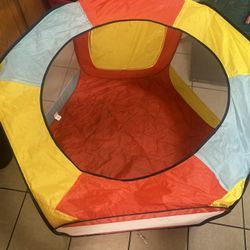 hexagonal pop-up play tent and ball pit.