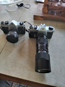 2. Camaras .....PENTAX. .las .2. . SP ...1000 ....travajan. .bien. Las. .2. . en. Duarte...por. Las .. dos. .