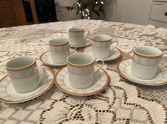 Espresso/demitasse cups and saucers. Set of 6. 20.00.  The box is torn.